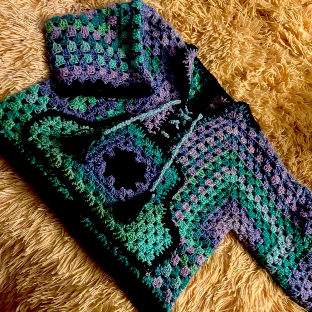 Hand crochet sweater and ear warmer headband.